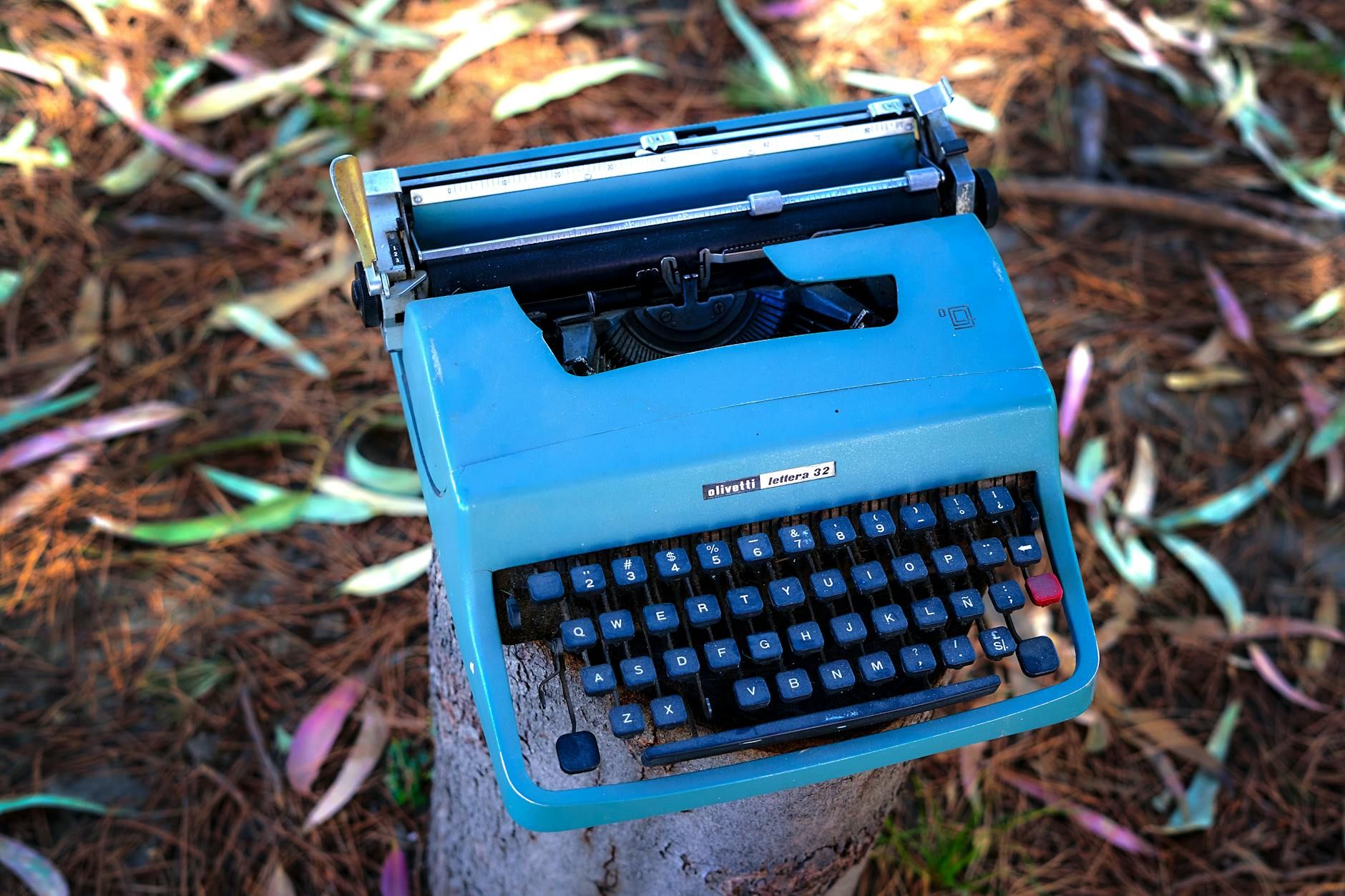 Vintage Typewriter on Tree Trunk